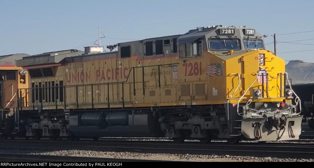 The Setting Wyoming Sun Reflects Off The Very Brand New UP Paint of UP 7281 A C44ACM Just Rebuilt in June 2023 at The Wabtec Fort Worth Locomotive Plant Texas.